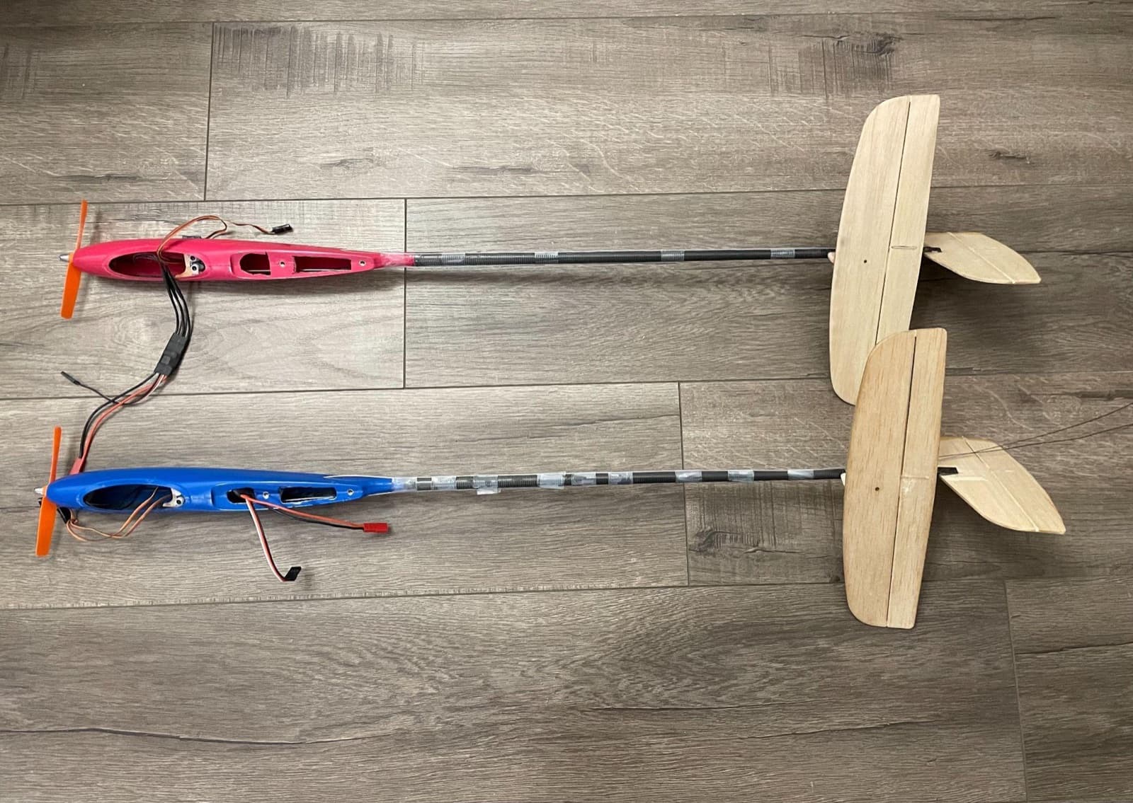 Two balsa boost gliders with carbon booms