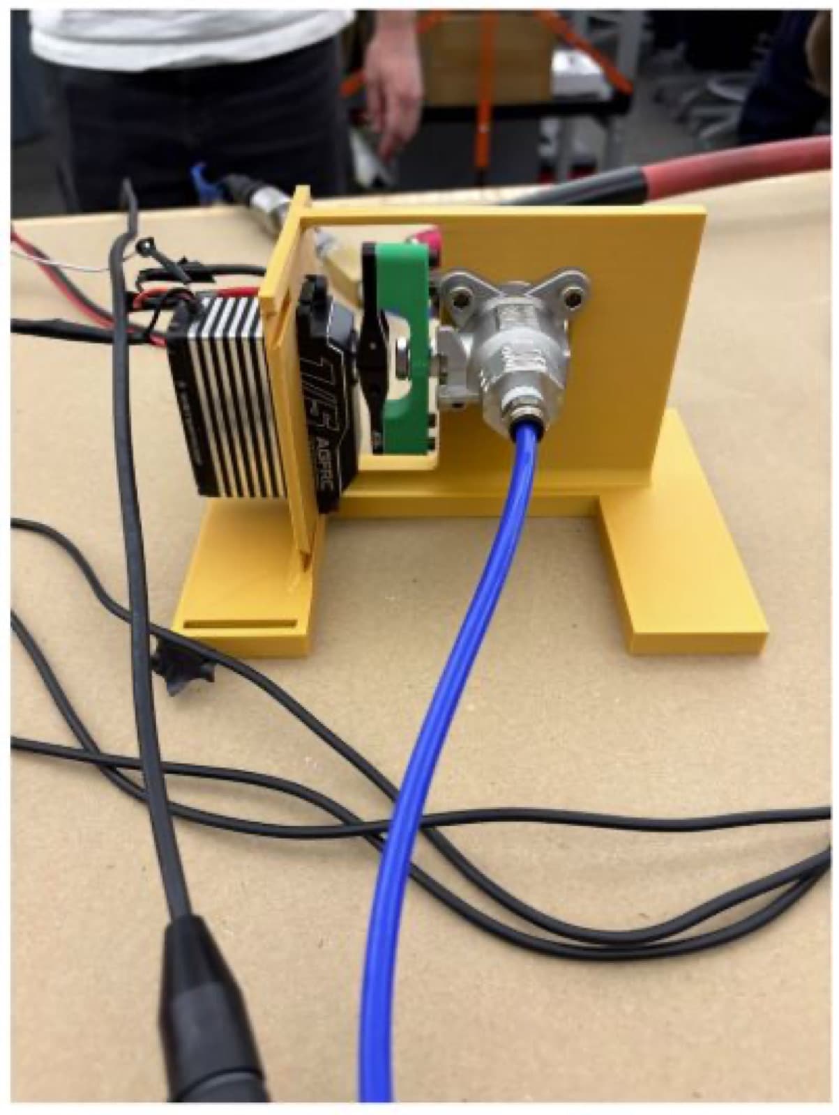 Servo and heat sink on the yellow printed stand driving the valve